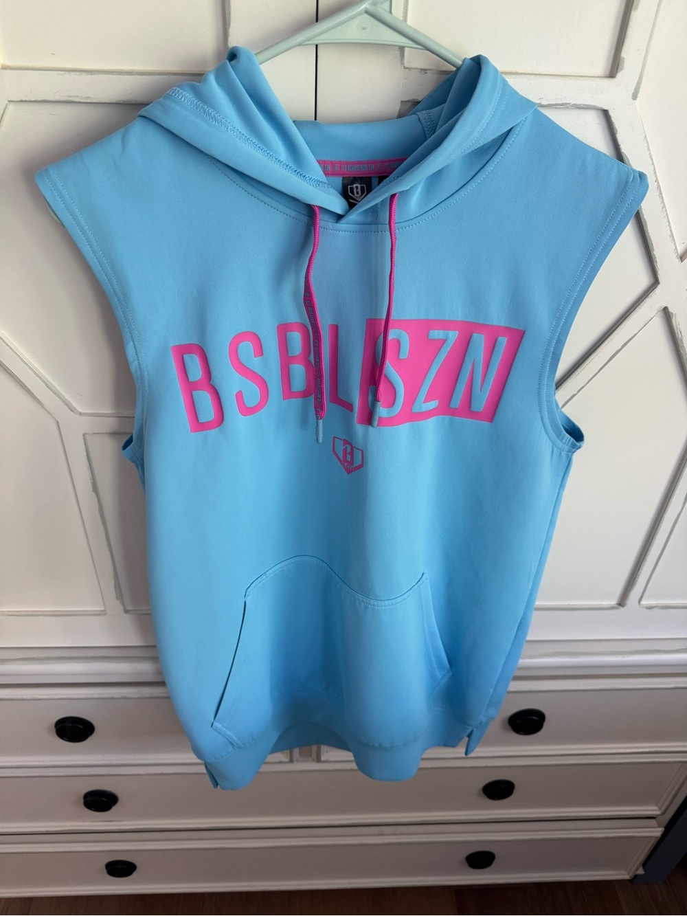 BSBL SZN Baseball Lifestyle 101 Sleeveless Hoodie in Light Blue with Pink Logo